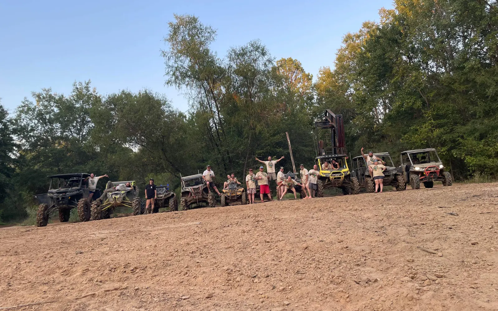 Off-road riders and machines out on the trail